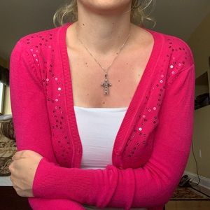 Pink cardigan and blue tank top
